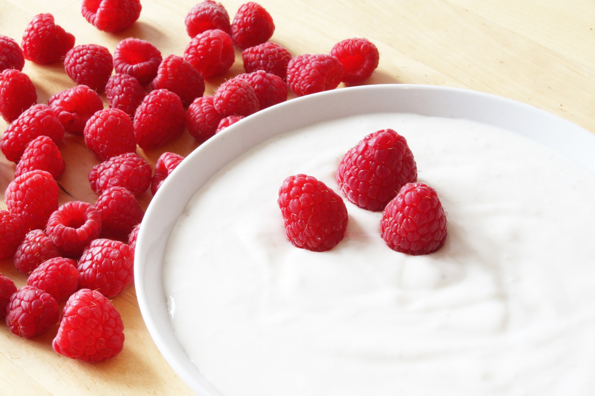 Image of a yogurt
                with raspberries
